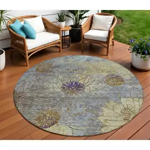 Photo of 8' Denim Blue And Gold Round Floral Washable Indoor Outdoor Area Rug