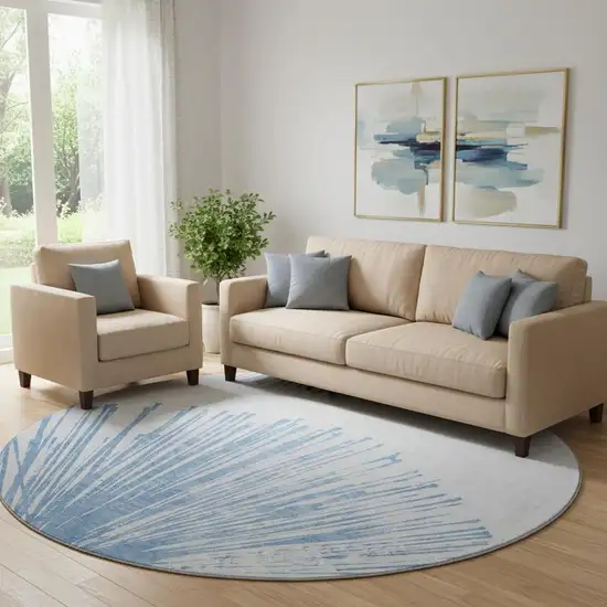 8' Denim Blue And Ivory Abstract Washable Round Rug With UV Protection Photo 1