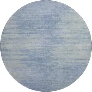 Photo of 8' Denim Blue And Ivory Abstract Washable Round Rug With UV Protection