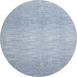 Photo of 8' Denim Blue And Ivory Abstract Washable Round Rug With UV Protection