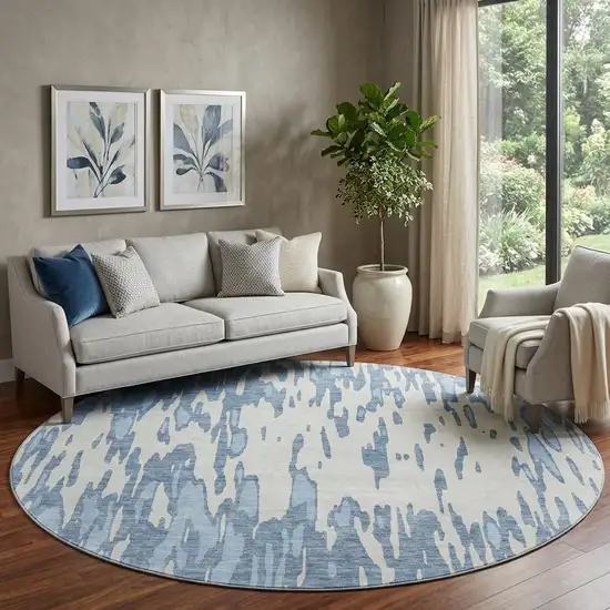 8' Denim Blue And Ivory Abstract Washable Round Rug With UV Protection Photo 1