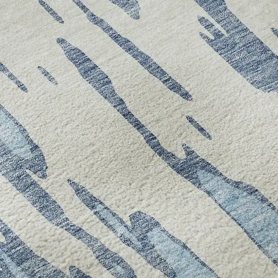 8' Denim Blue And Ivory Abstract Washable Round Rug With UV Protection Photo 7