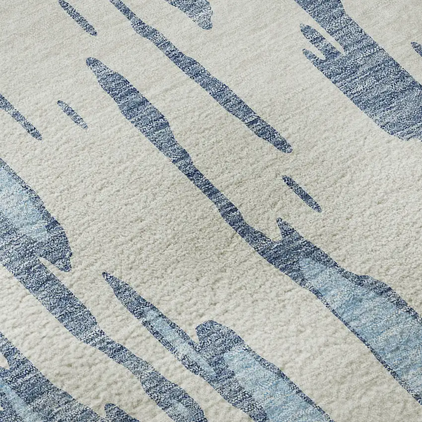 8' Denim Blue And Ivory Abstract Washable Round Rug With UV Protection Photo 7