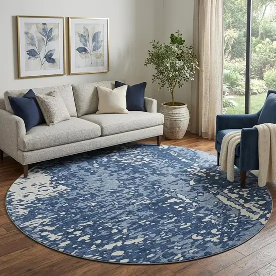 8' Denim Blue And Ivory Abstract Washable Round Rug With UV Protection Photo 1