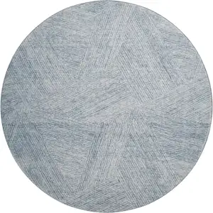 Photo of 8' Denim Blue And Ivory Abstract Washable Round Rug With UV Protection