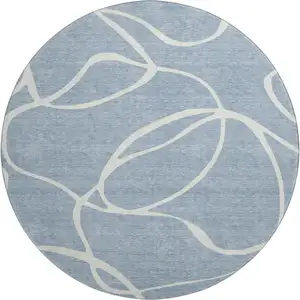 Photo of 8' Denim Blue And Ivory Abstract Washable Round Rug With UV Protection