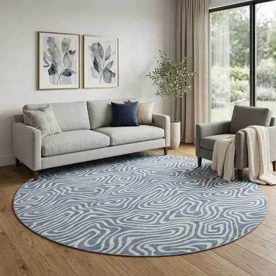 8' Denim Blue And Ivory Abstract Washable Round Rug With UV Protection Photo 1