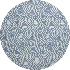 Photo of 8' Denim Blue And Ivory Abstract Washable Round Rug With UV Protection