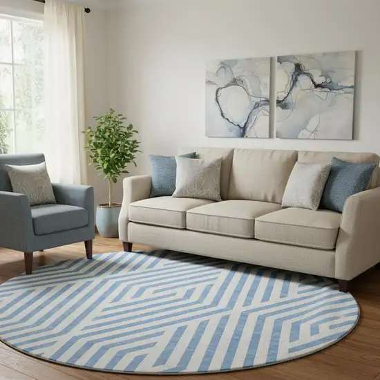8' Denim Blue And Ivory Geometric Washable Round Rug With UV Protection Photo 1
