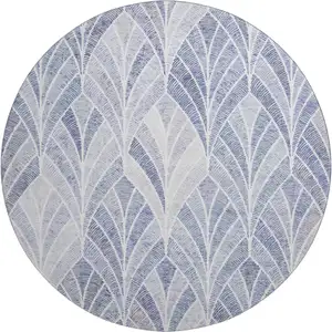 Photo of 8' Denim Blue And Ivory Geometric Washable Round Rug With UV Protection