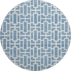 Photo of 8' Denim Blue And Ivory Geometric Washable Round Rug With UV Protection