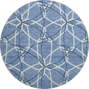 Photo of 8' Denim Blue And Ivory Geometric Washable Round Rug With UV Protection