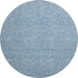 Photo of 8' Denim Blue And Ivory Geometric Washable Round Rug With UV Protection
