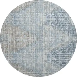 Photo of 8' Denim Blue And Ivory Geometric Washable Round Rug With UV Protection