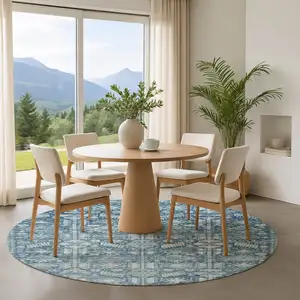 Photo of 8' Denim Blue And Ivory Oriental Washable Round Rug With UV Protection
