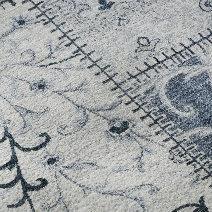 8' Denim Blue And Ivory Patchwork Washable Round Rug With UV Protection Photo 9