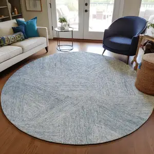 Photo of 8' Denim Blue And Ivory Round Abstract Washable Indoor Outdoor Area Rug