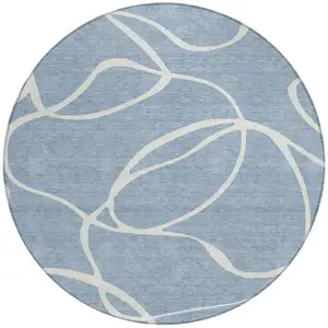 Photo of 8' Denim Blue And Ivory Round Abstract Washable Indoor Outdoor Area Rug
