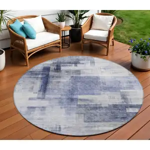 Photo of 8' Denim Blue And Ivory Round Abstract Washable Indoor Outdoor Area Rug