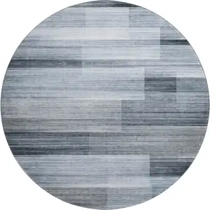 Photo of 8' Denim Blue And Ivory Striped Washable Round Rug With UV Protection