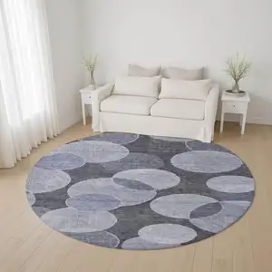 Photo of 8' Denim Blue And Sky Blue Geometric Washable Round Rug With UV Protection