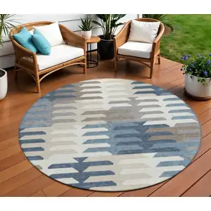 Photo of 8' Denim Blue Beige And Ivory Round Geometric Washable Indoor Outdoor Area Rug