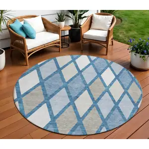 Photo of 8' Denim Blue Beige And Ivory Round Geometric Washable Indoor Outdoor Area Rug