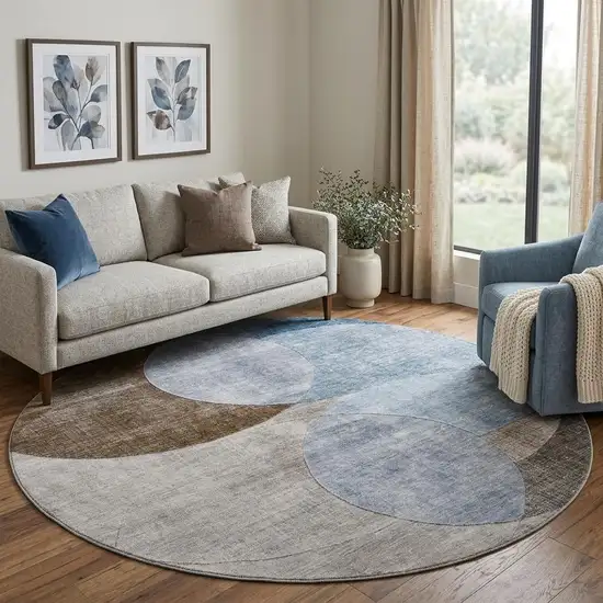 8' Denim Blue Brown And Beige Geometric Washable Round Rug With UV Protection Photo 1