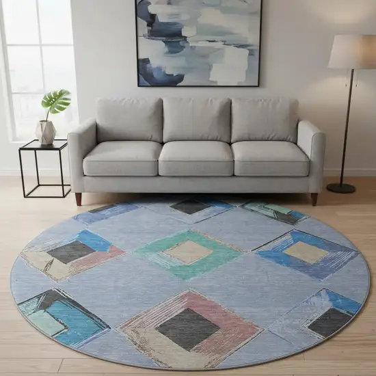 8' Denim Blue Charcoal And Mauve Geometric Washable Round Rug With UV Protection Photo 2