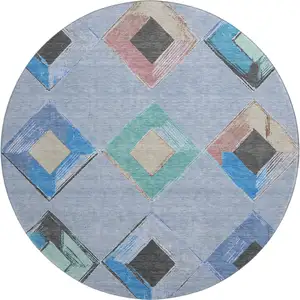 Photo of 8' Denim Blue Charcoal And Mauve Geometric Washable Round Rug With UV Protection