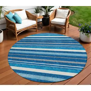 Photo of 8' Denim Blue Gray And Ivory Round Striped Washable Indoor Outdoor Area Rug