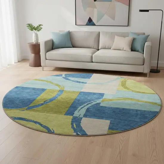 8' Denim Blue Green And Ivory Geometric Washable Round Rug With UV Protection Photo 2