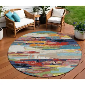 Photo of 8' Denim Blue Green Red And Orange Round Abstract Washable Indoor Outdoor Area Rug
