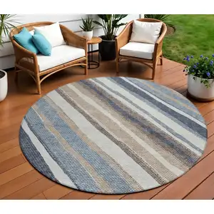 Photo of 8' Denim Blue Ivory And Beige Round Striped Washable Indoor Outdoor Area Rug