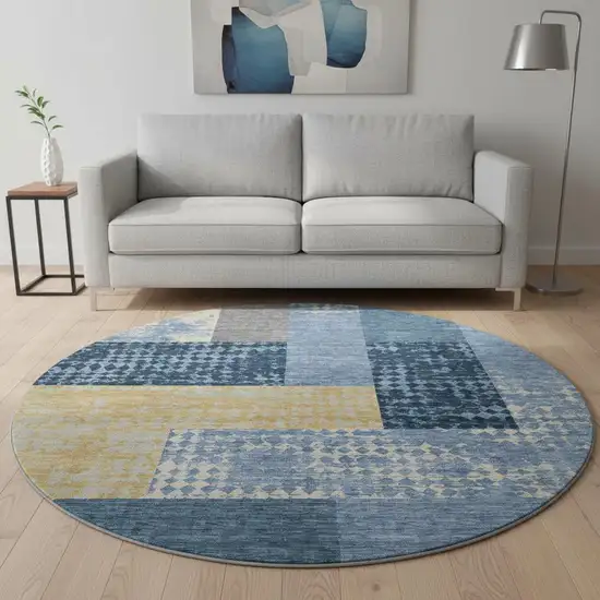 8' Denim Blue Ivory And Gold Geometric Washable Round Rug With UV Protection Photo 2