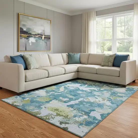 8' Denim Blue Ivory And Green Abstract Washable Area Rug With UV Protection Photo 2