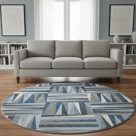 8' Denim Blue Ivory And Taupe Geometric Washable Round Rug With UV Protection Photo 2