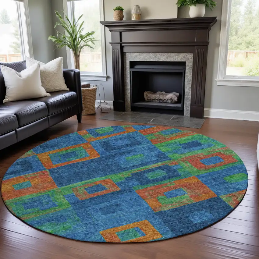 8' Denim Blue Orange And Green Geometric Washable Round Rug With UV Protection Photo 3
