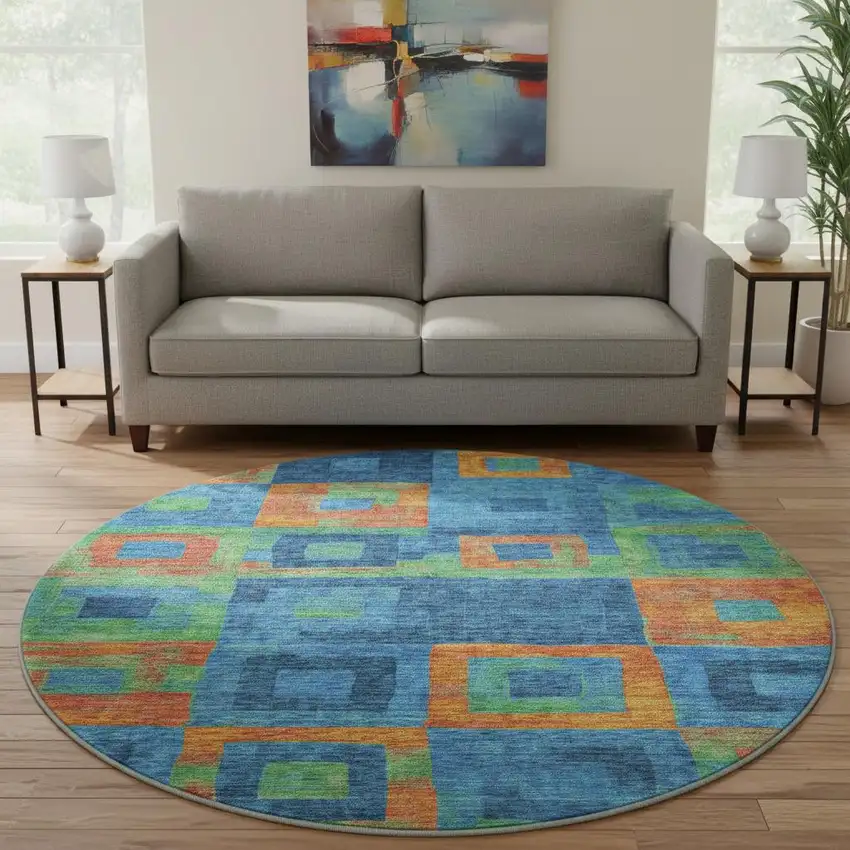 8' Denim Blue Orange And Green Geometric Washable Round Rug With UV Protection Photo 2