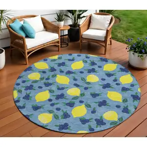 Photo of 8' Denim Blue Yellow And Green Round Lemons Washable Indoor Outdoor Area Rug