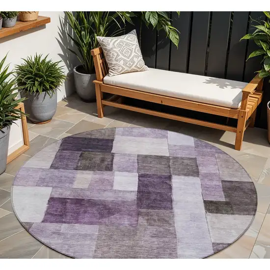 8' Eggplant Black And Lavender Round Geometric Washable Indoor Outdoor Area Rug Photo 1