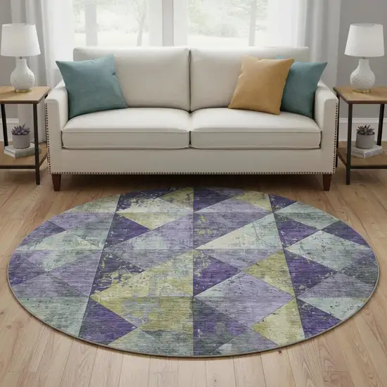 8' Eggplant Gold And Ivory Geometric Washable Round Rug With UV Protection Photo 2