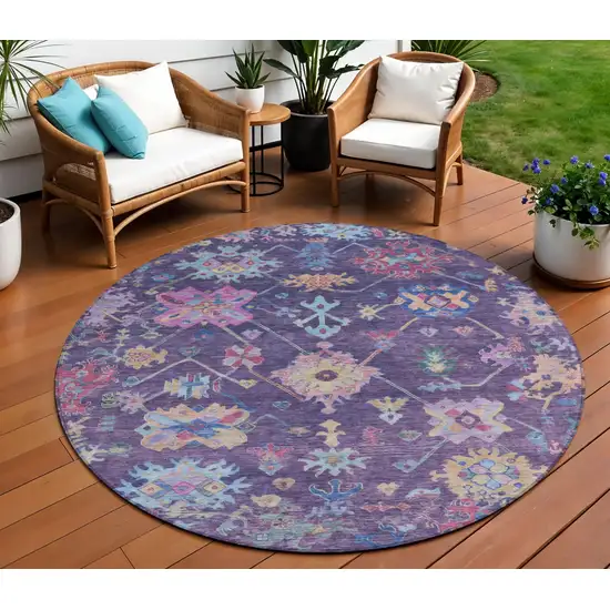 8' Eggplant Pink And Gold Round Floral Washable Indoor Outdoor Area Rug Photo 1