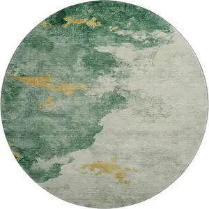 Photo of 8' Emerald And Gold Abstract Washable Round Rug With UV Protection