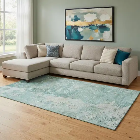 8' Emerald Pale Aqua And Ivory Abstract Washable Area Rug With UV Protection Photo 2