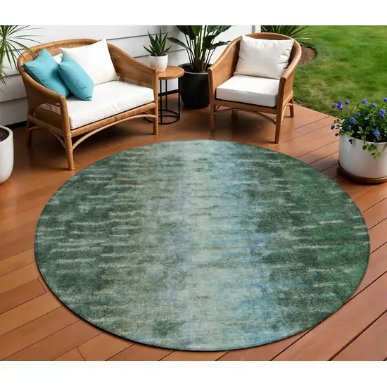 8' Emerald Teal Blue And Ivory Round Abstract Washable Indoor Outdoor Area Rug Photo 1