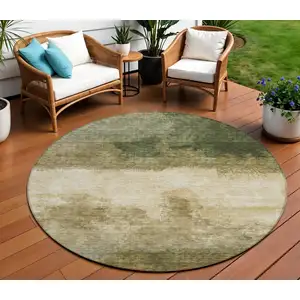 Photo of 8' Fern Green And Beige Round Abstract Washable Indoor Outdoor Area Rug