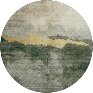 Photo of 8' Fern Green And Gold Abstract Washable Round Rug With UV Protection