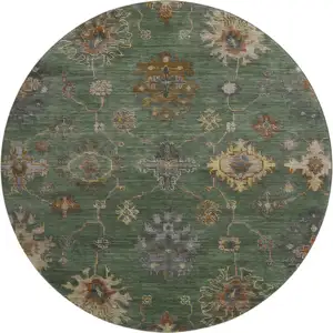 Photo of 8' Fern Green And Gold Oriental Washable Round Rug With UV Protection