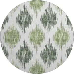 Photo of 8' Fern Green And Ivory Ikat Washable Round Rug With UV Protection
